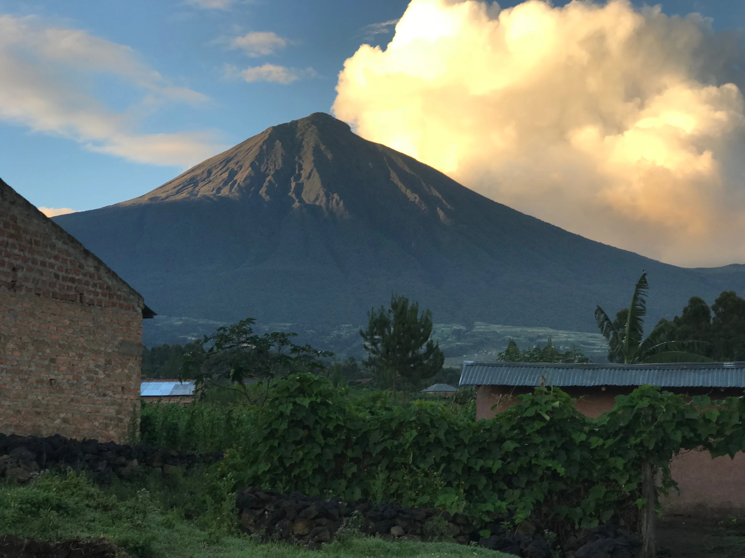Virunga volcano peak wreathed in cloud, Volcanoes National Park